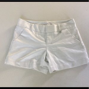 CALVIN KLEIN shorts SZ 2. White with silver.